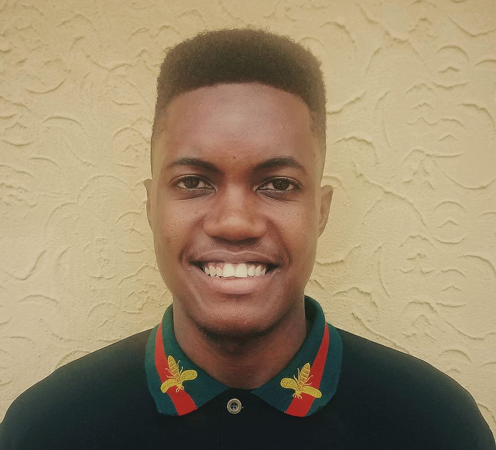 A Headshot of Ayo Isaiah